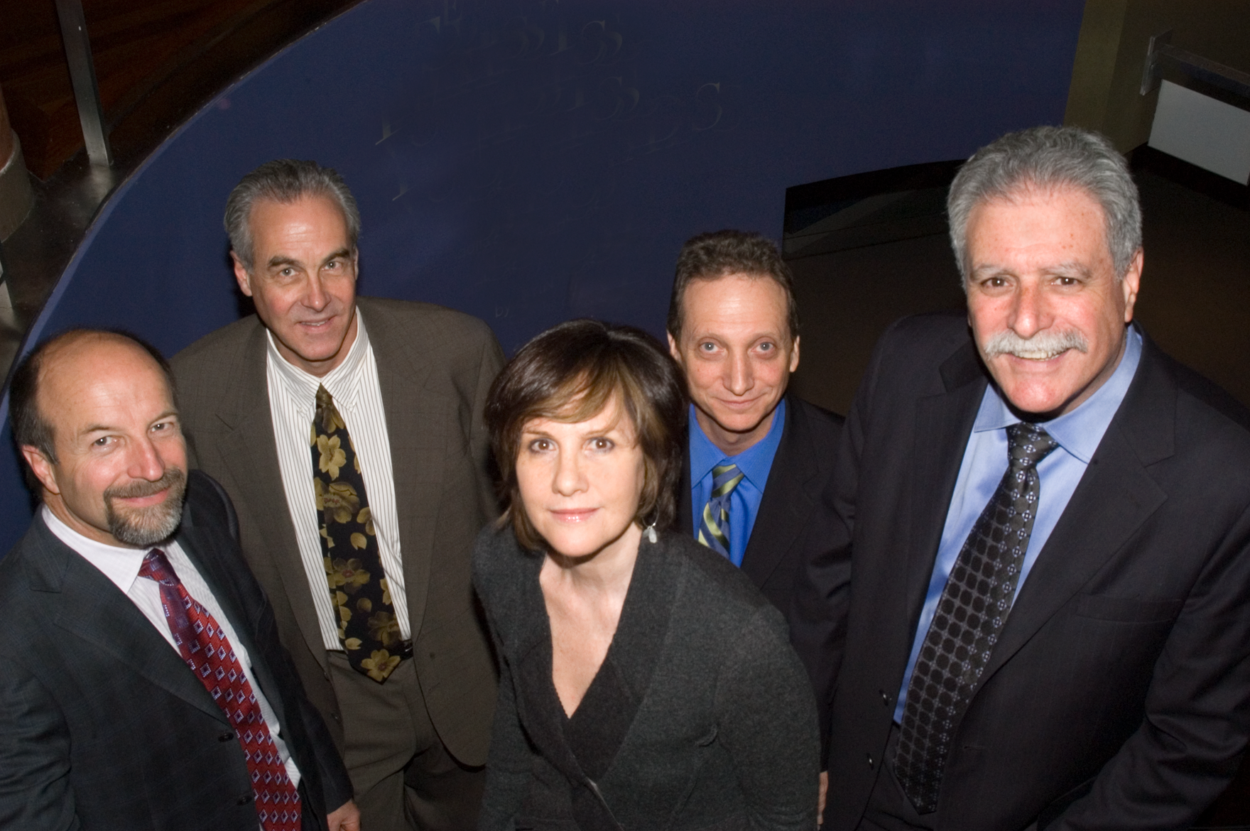 A photo of the five Veris Founders including David Hills, Anders Ferguson, Patricia Farrar-Rivas, Michael Lent, and Steve Fahrer.