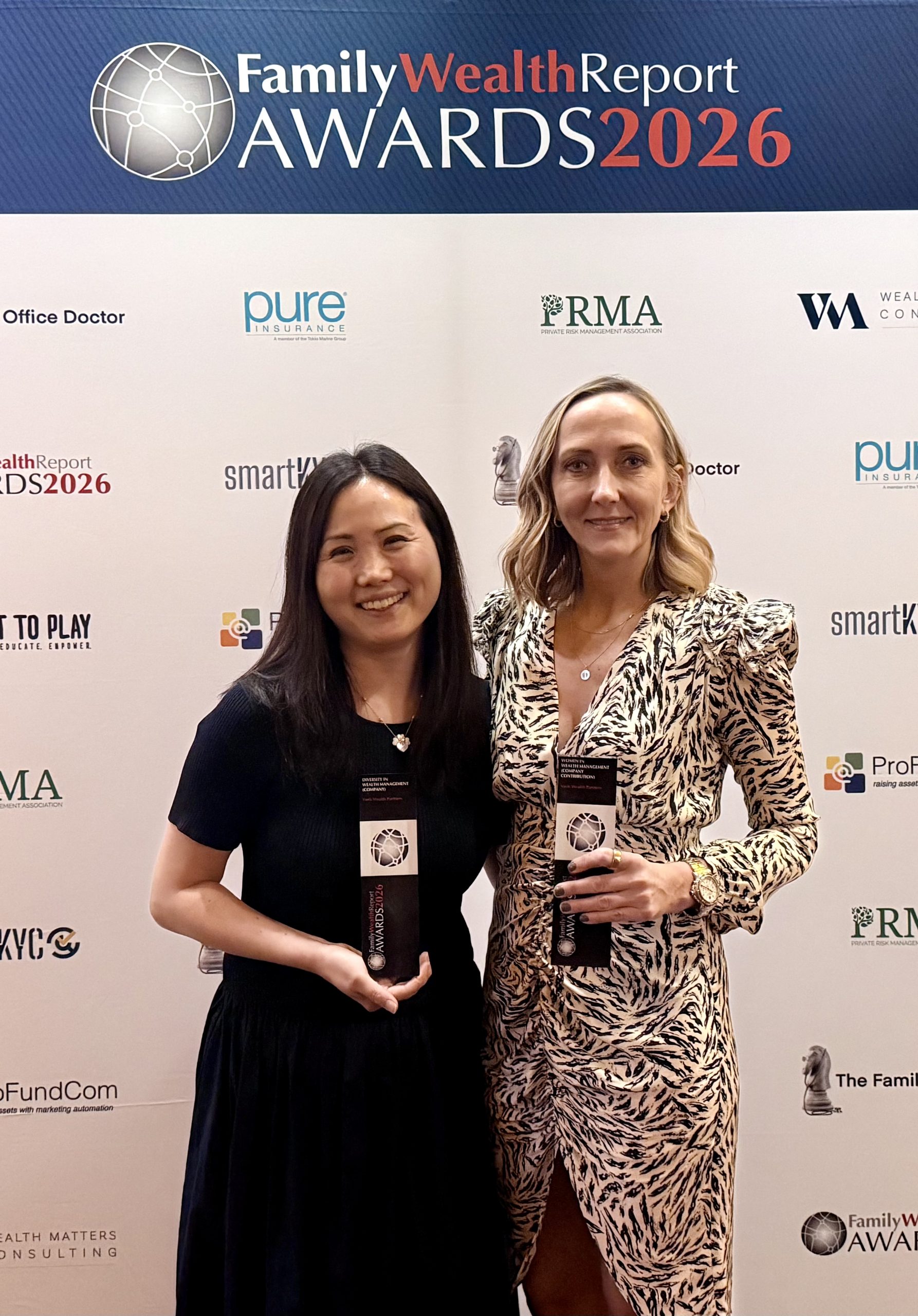 Veris Senior Advisor Elena Ladygina and Senior Advisor Lori Choi hold the firm’s 2026 Family Wealth Report Awards for Women in Wealth Management and Diversity in Wealth Management after the Gala ceremony in NYC on April 30, 2026.